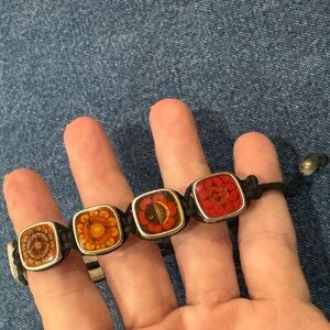 Handcrafted chakra symbols corded bracelet from Erwin Pearl. EUC!